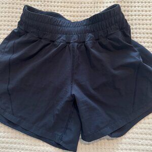 Lululemon Navy track that lined 5 inch short size 4 - Like New